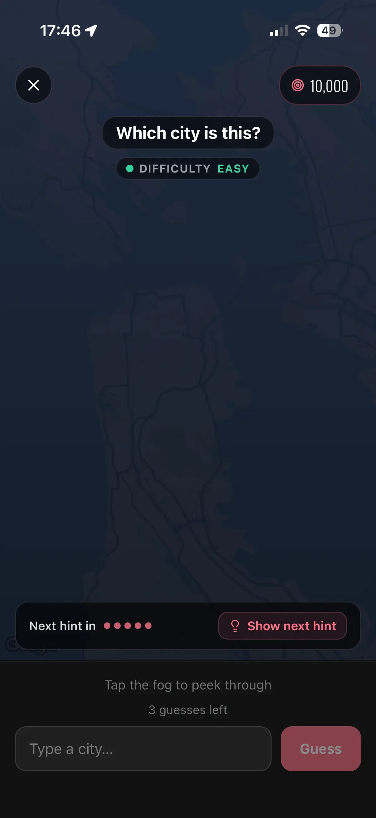Fog Guesser round start: a city map completely hidden under fog with 10,000 points at stake